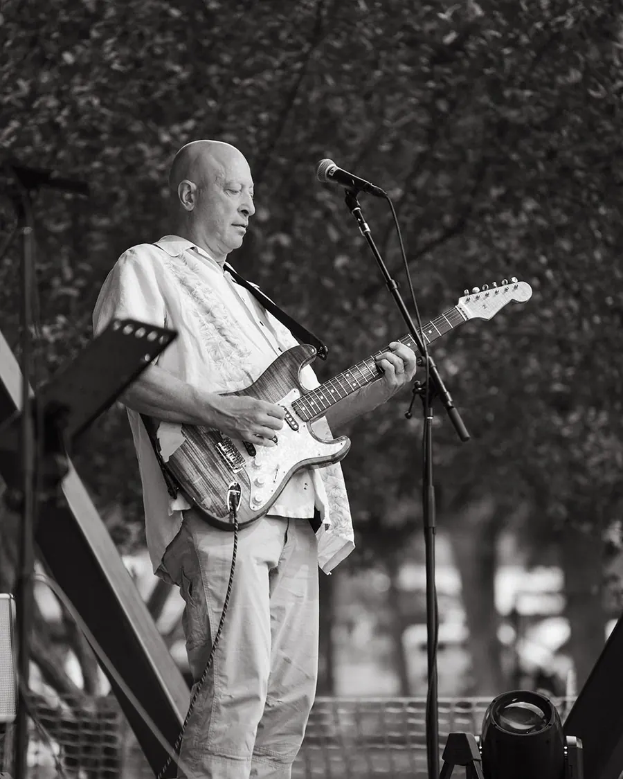 Stefan Davenport playing guitar