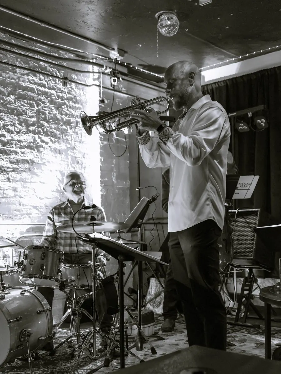 Zan Waller on trumpet with the band at a club date